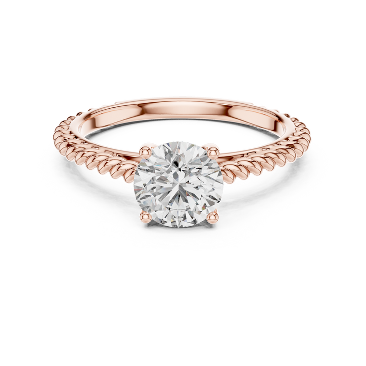 1 carat 6.5mm round lab-grown diamond engagement ring featuring a braided, twisted rope rose gold band by The Brillora Jewellery House, isolated on a black background.
